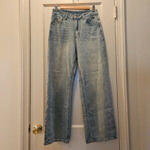 Wide leg distressed jeans.